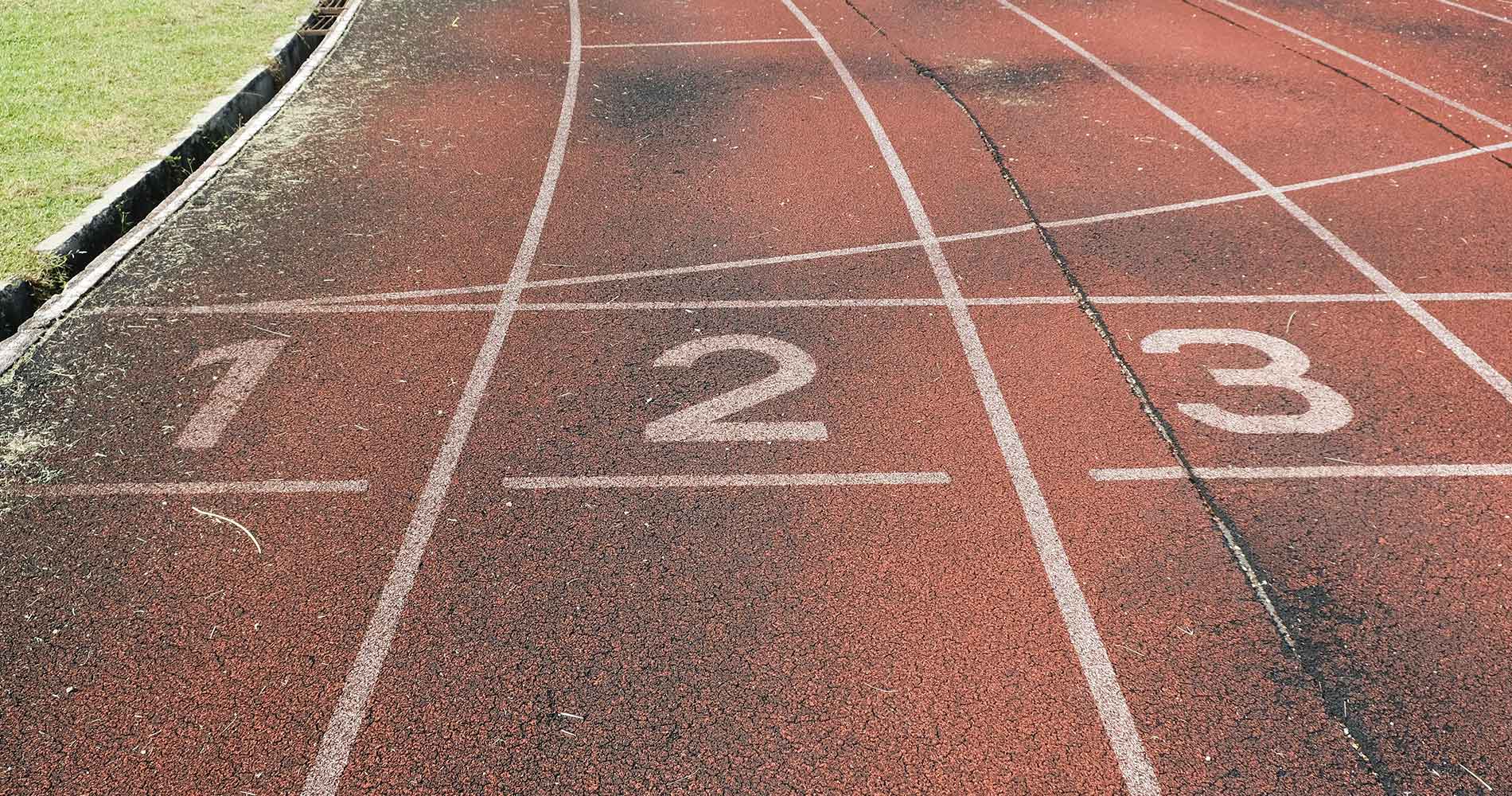 A running track with numbers on it.